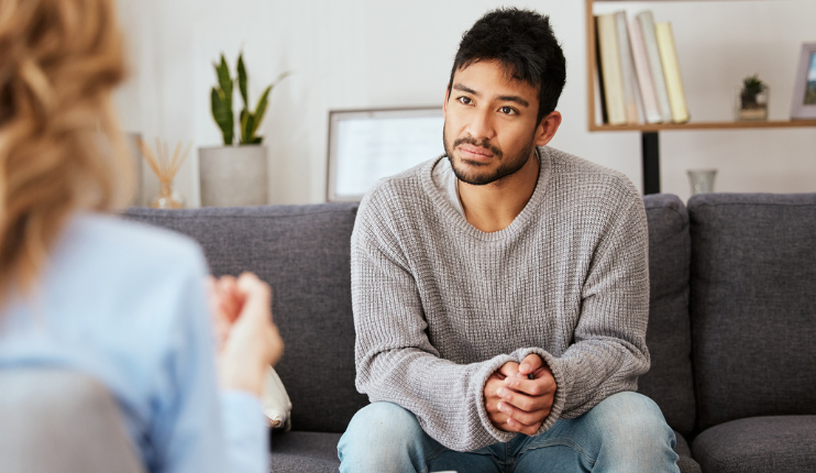 man in therapy session