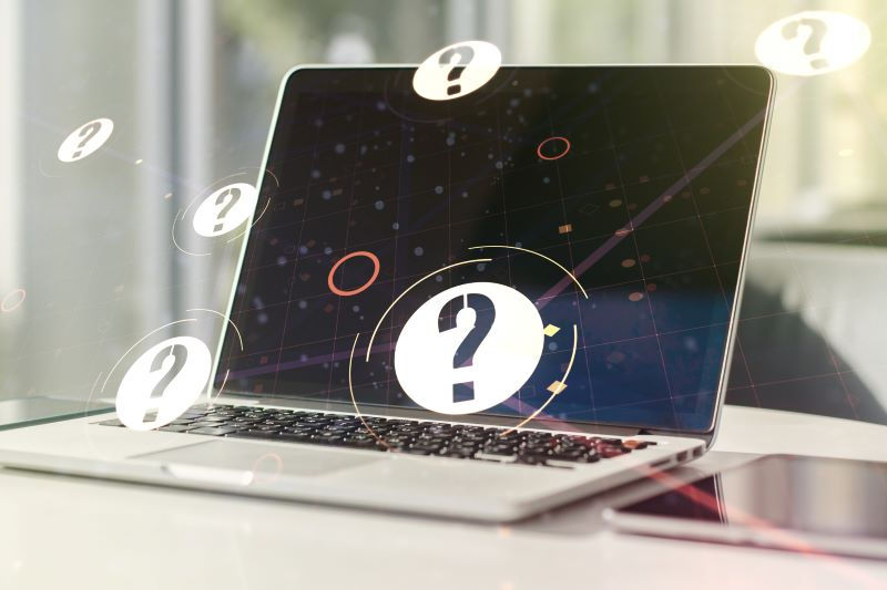Career Quiz Laptop With Floating Question Mark