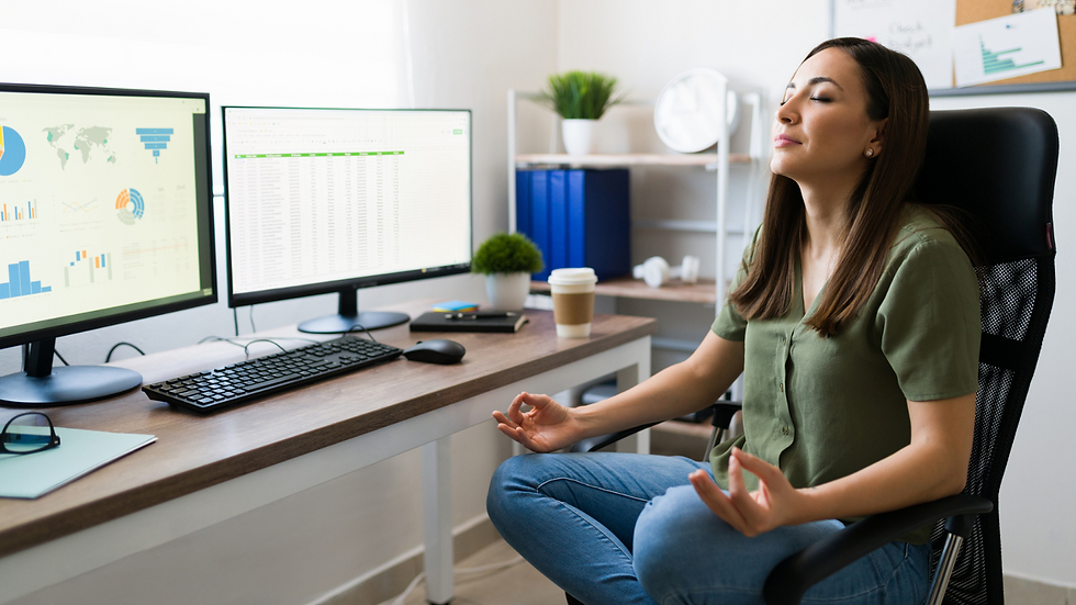 woman meditating in front of her desk. maintaining healthy well-being and mental health