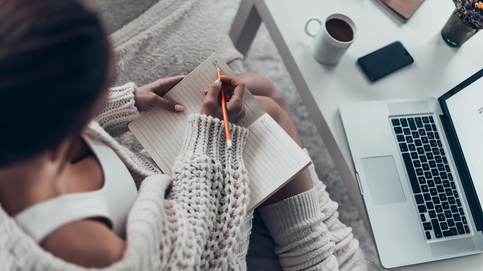 lady writing on her journal