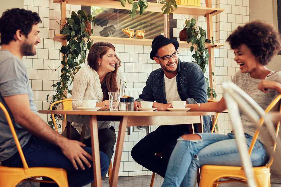 Diverse group of friends having conversations
