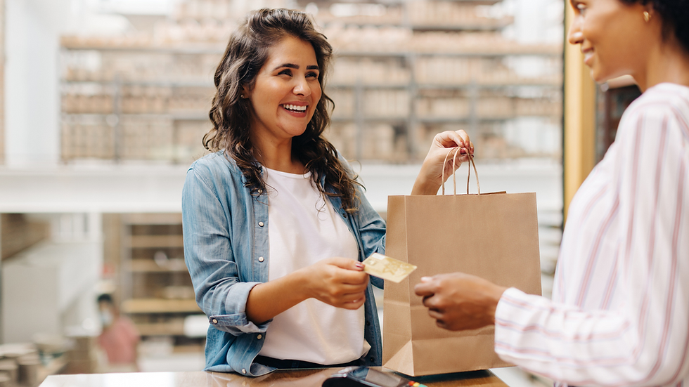 lady shopping and paying with her credit card