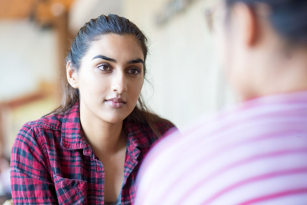 Lady actively listening to a man