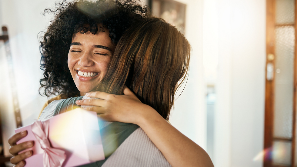 two women hugging each other